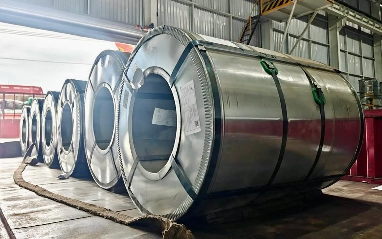 Packaged steel coils lined up in the workshop ready for shipment